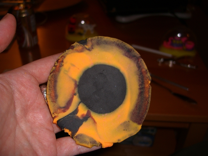 CIMG1584.JPG - I mashed up the remaining Play-Doh and made this, which looks (to me) just like the Eye of Sauron. Hee.