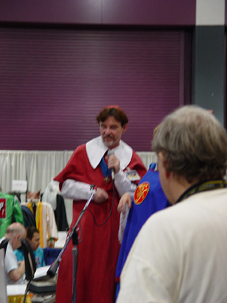 DSC02167.jpg - Jay Caselberg as the Cardinal vs. Esther Friesner as the SFWA Queen